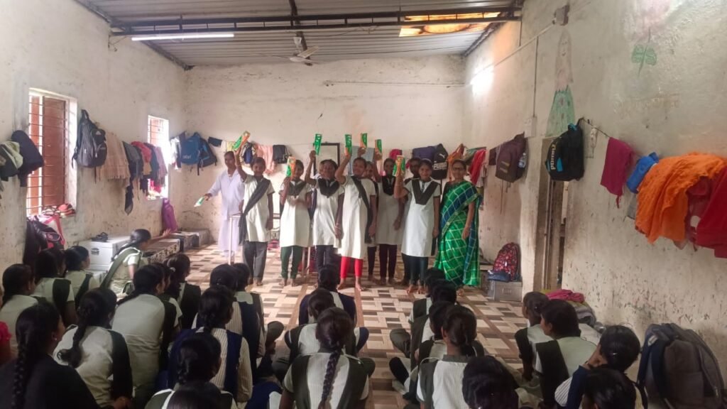 Sanitary pads distribution to adivasi school girls at Rajur